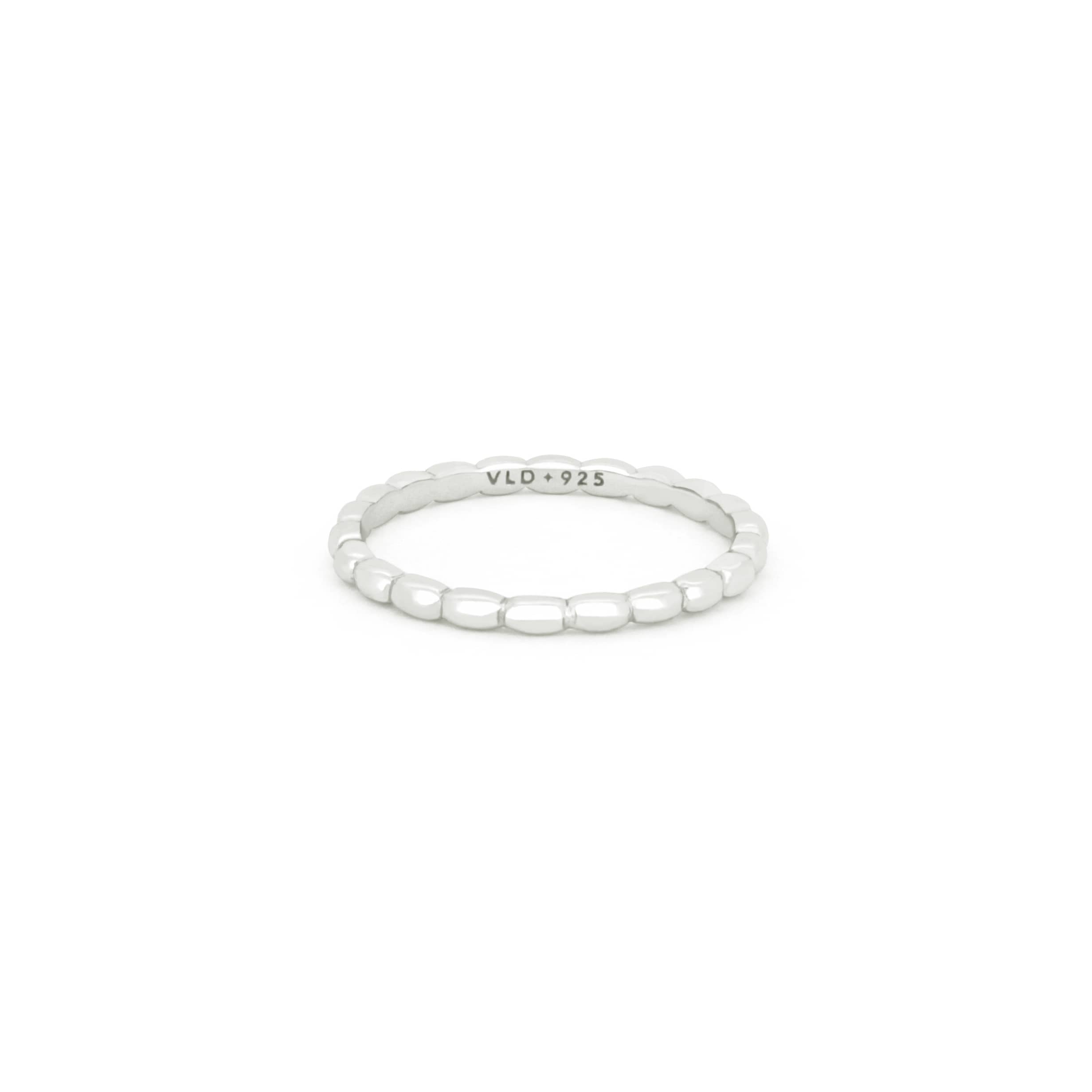 Minimal slim silver ring for everyday wear.