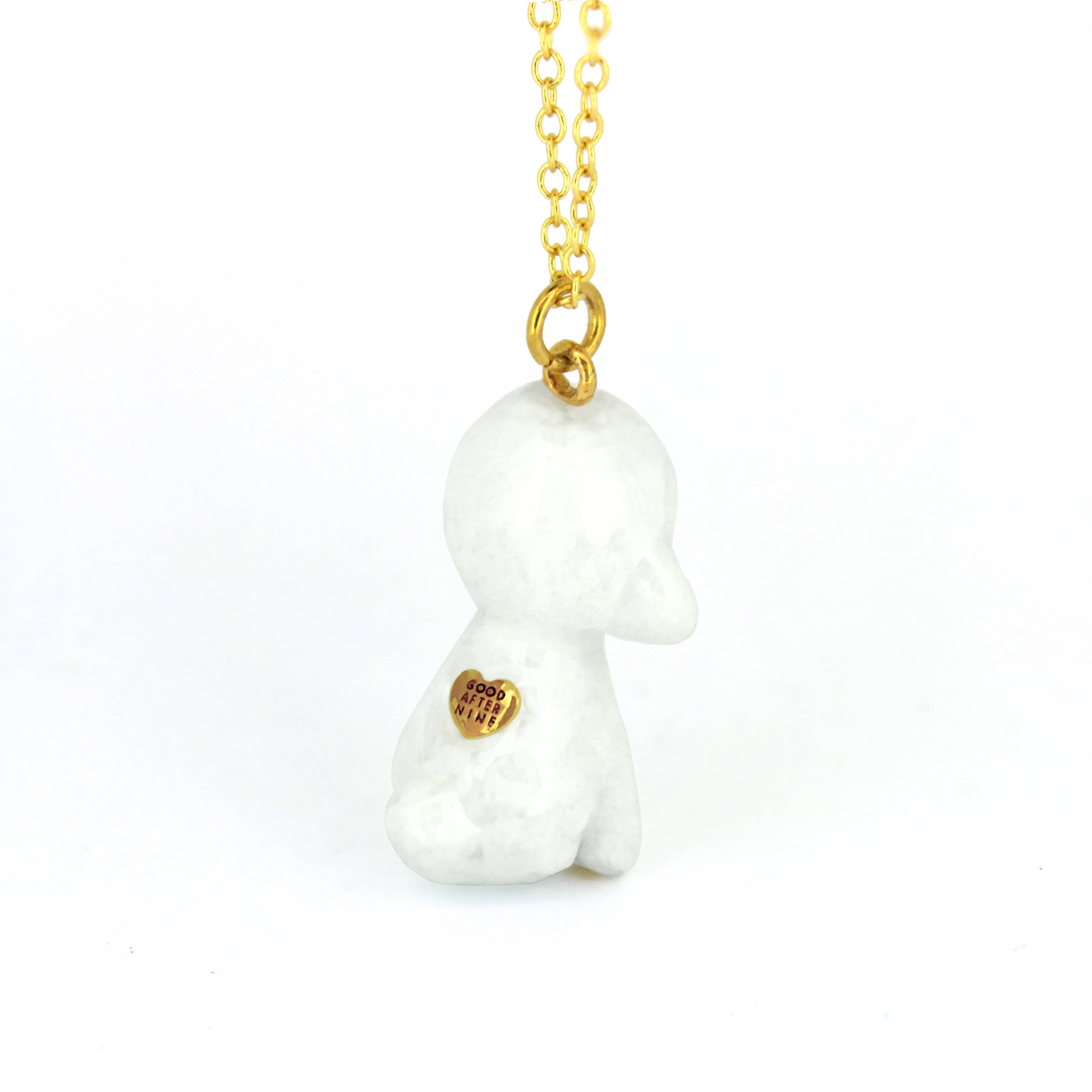 Handcrafted white poodle pendant necklace with intricate details