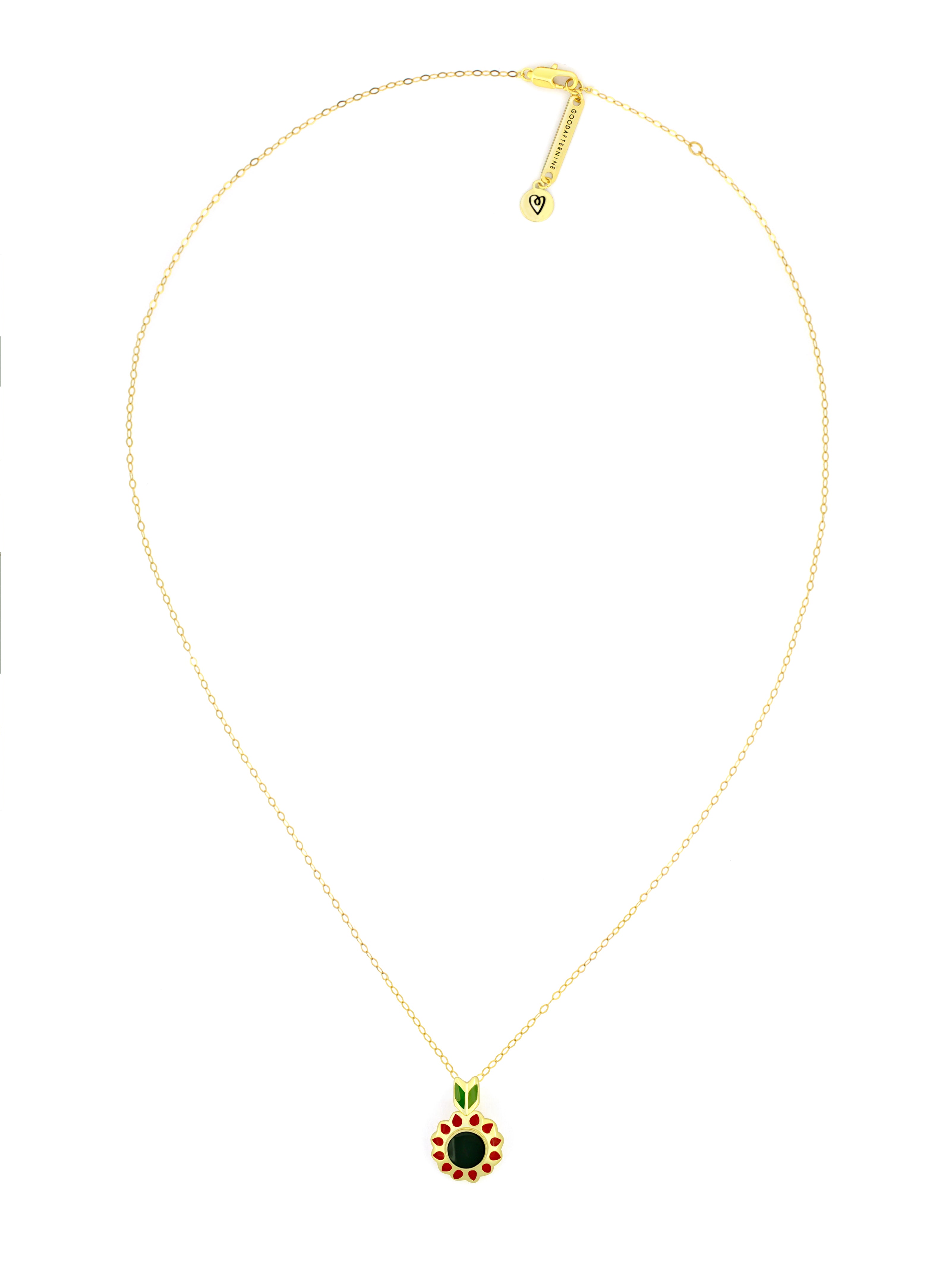 Nature-inspired autumn necklace featuring a floral design with red and green accents.