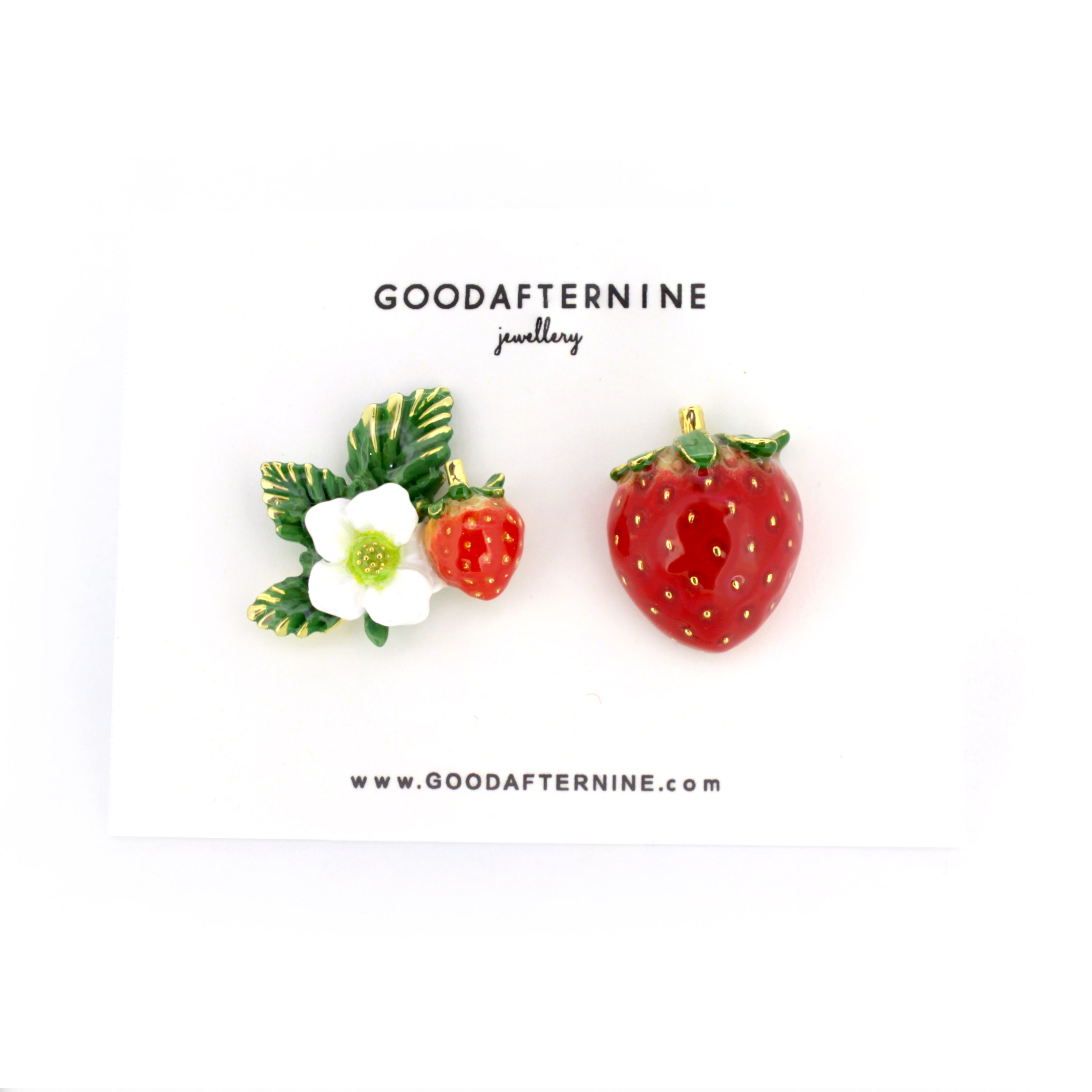 Strawberry-themed earrings featuring a large strawberry and a smaller flower with green leaves design.