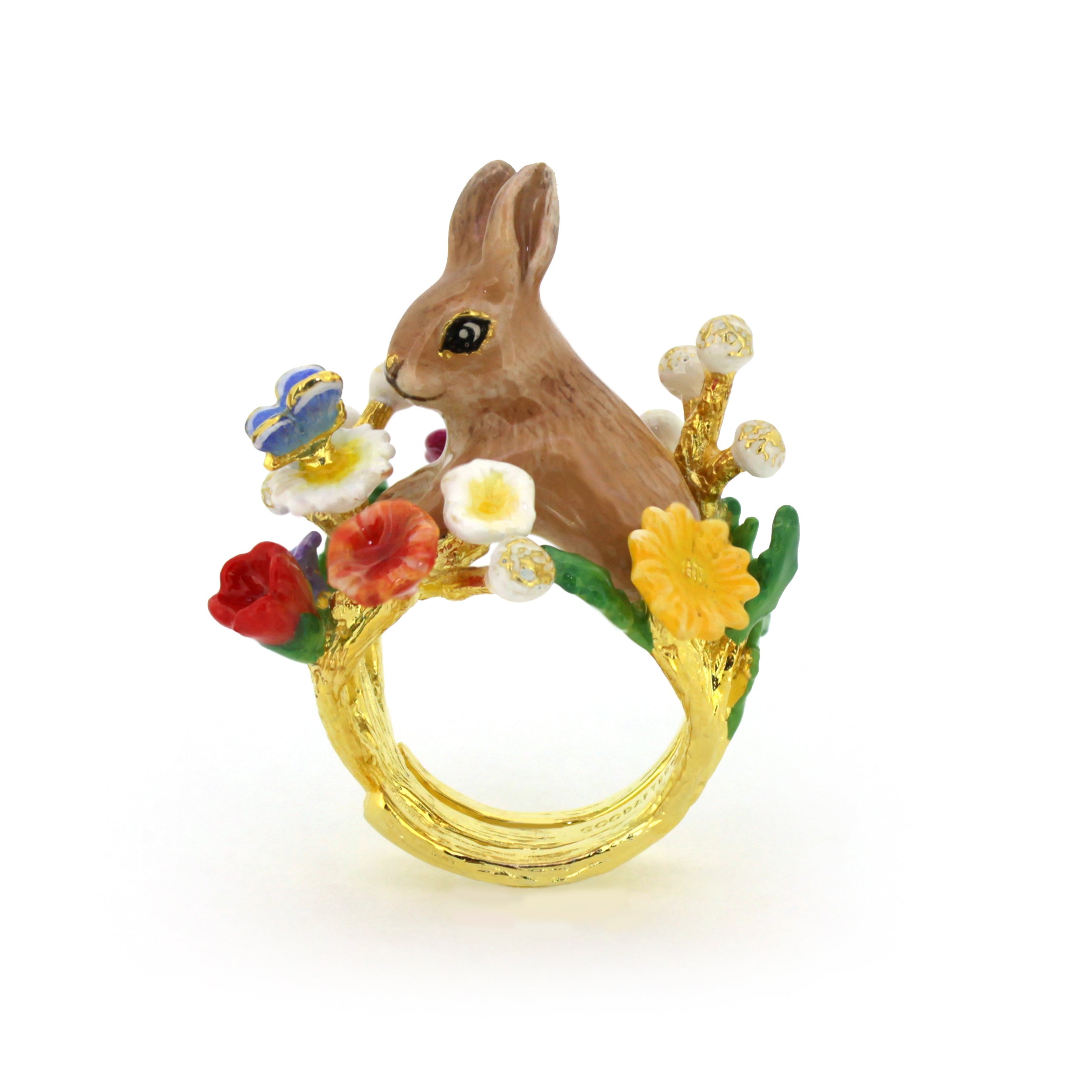 Nature-inspired ring featuring a rabbit surrounded by colorful flowers and a blue butterfly