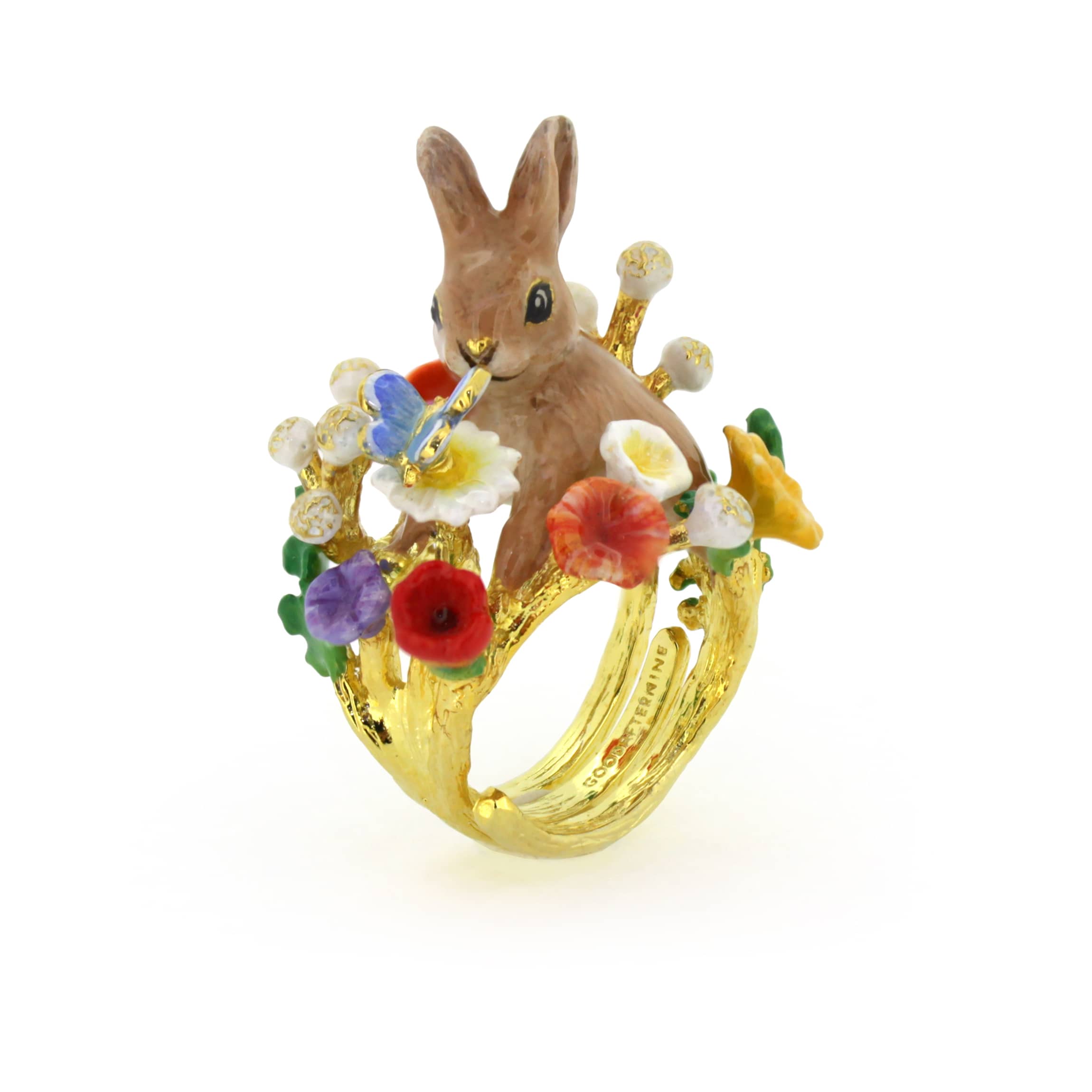 Nature-inspired ring featuring a rabbit surrounded by colorful flowers and a blue butterfly