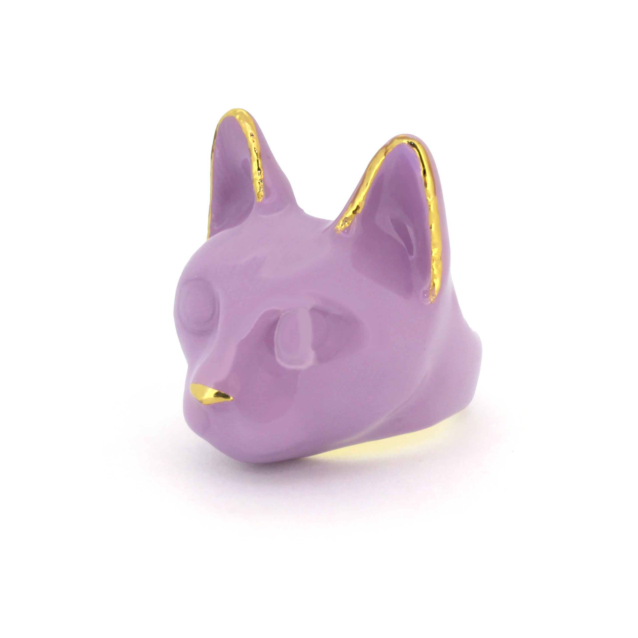 Unique ring designed in the shape of a cat’s head, featuring a pastel color.
