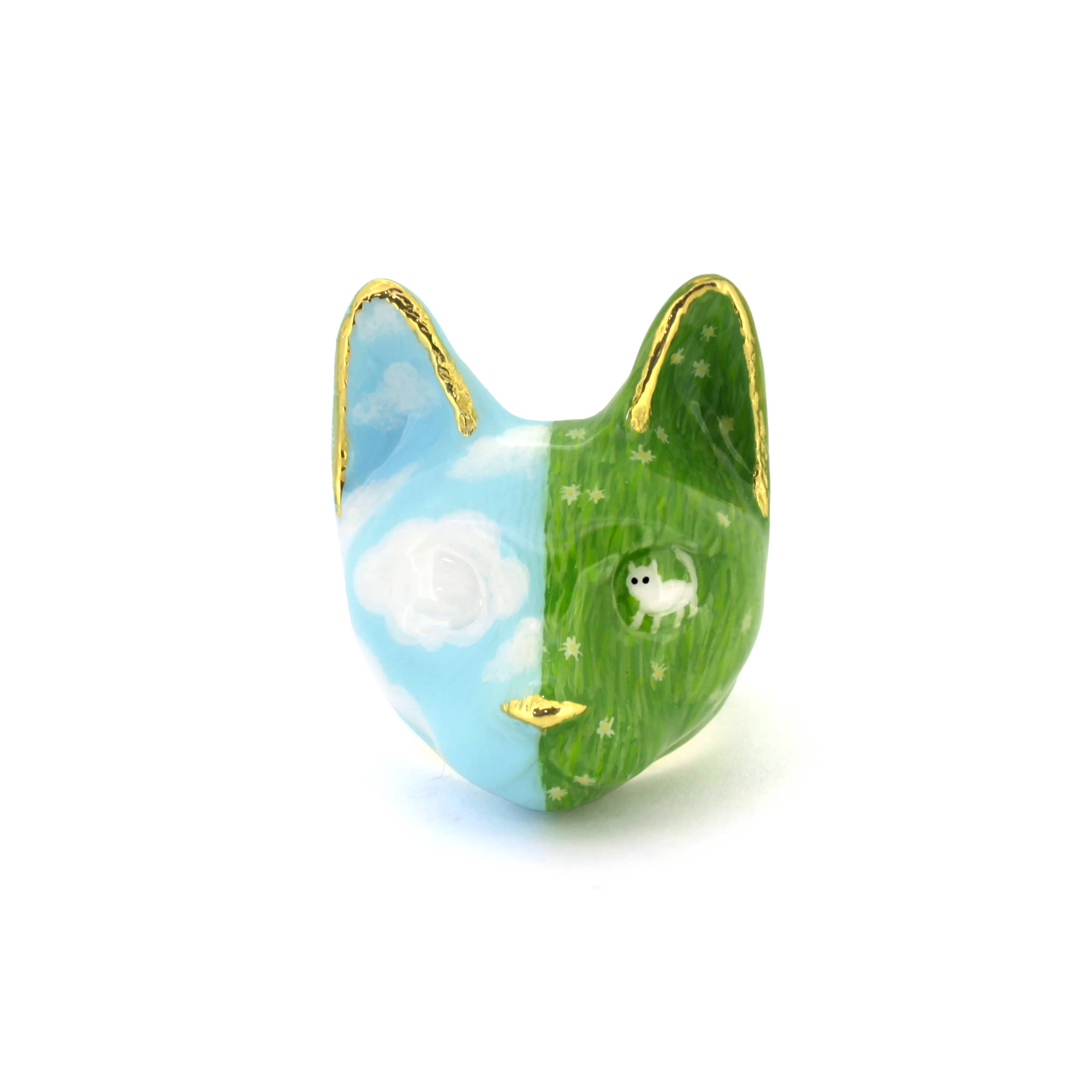Unique hand-painted cat ring  featuring a bright blue sky and a kitten among green field.