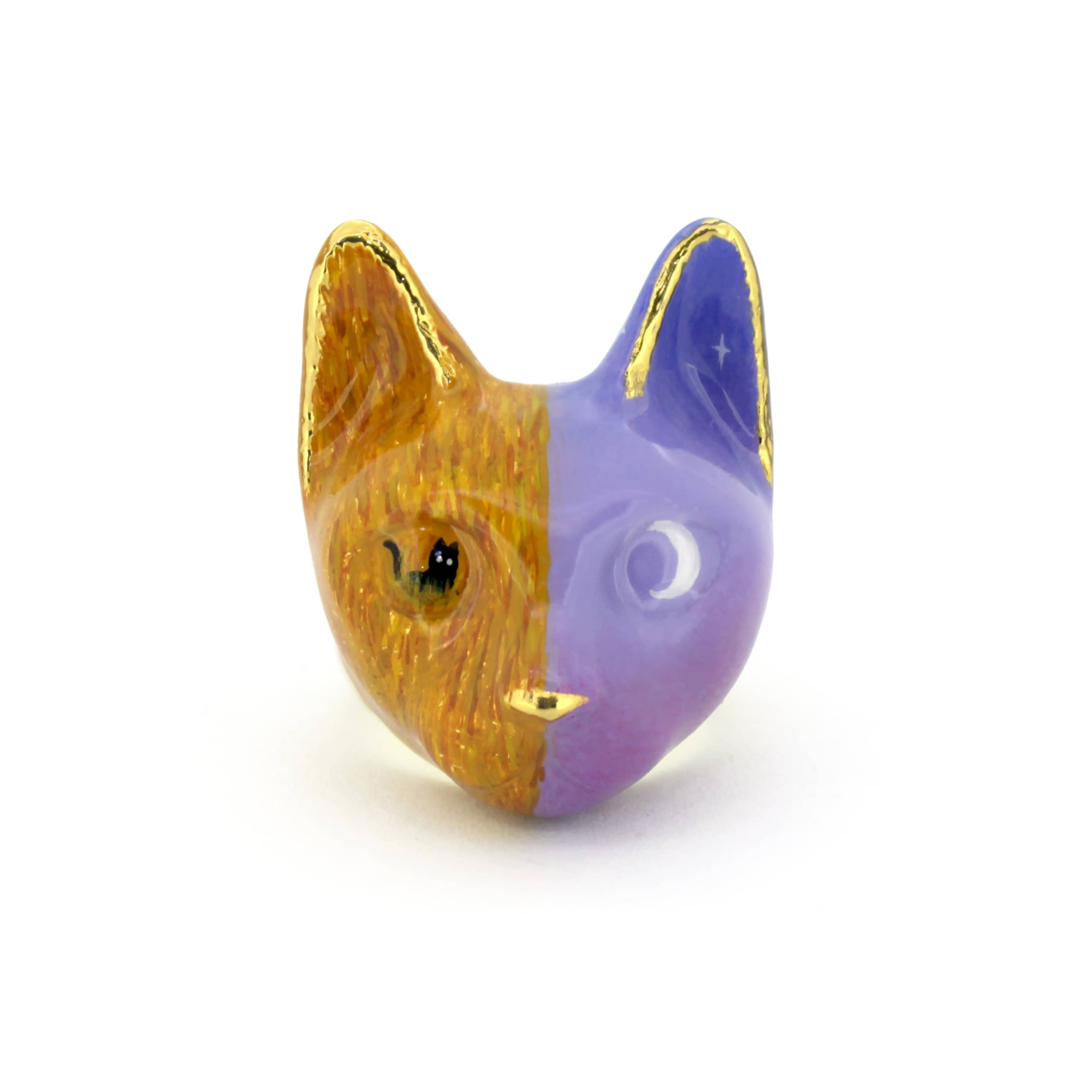 Artistic cat ring with purple and orange design.