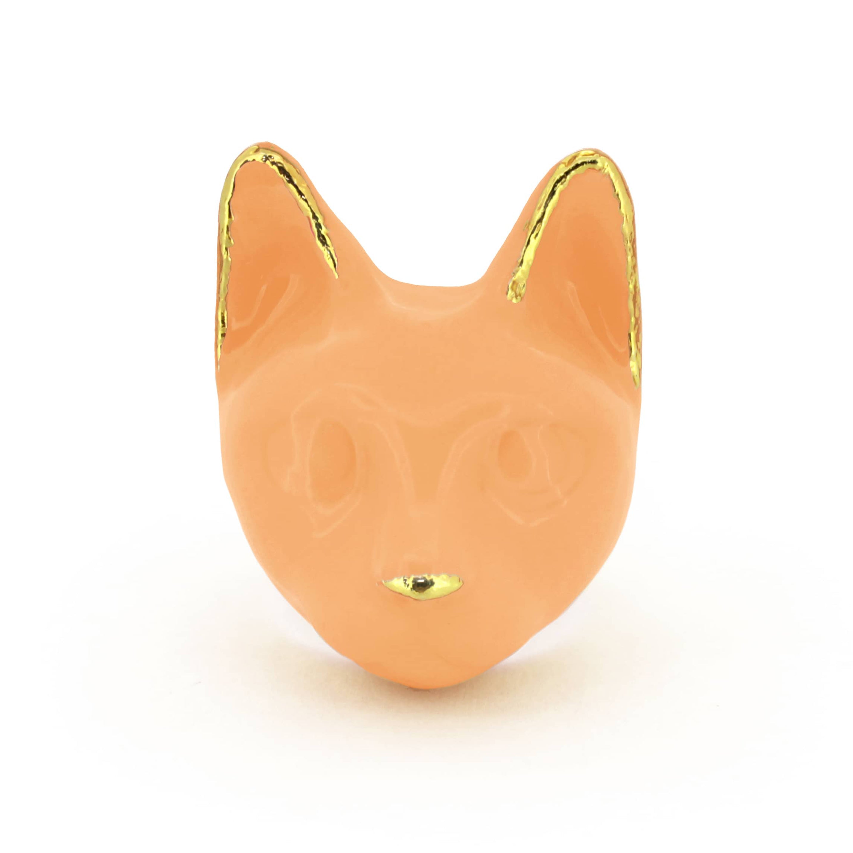 A orange cat's head ring with gold accents on the ears and a small gold nose