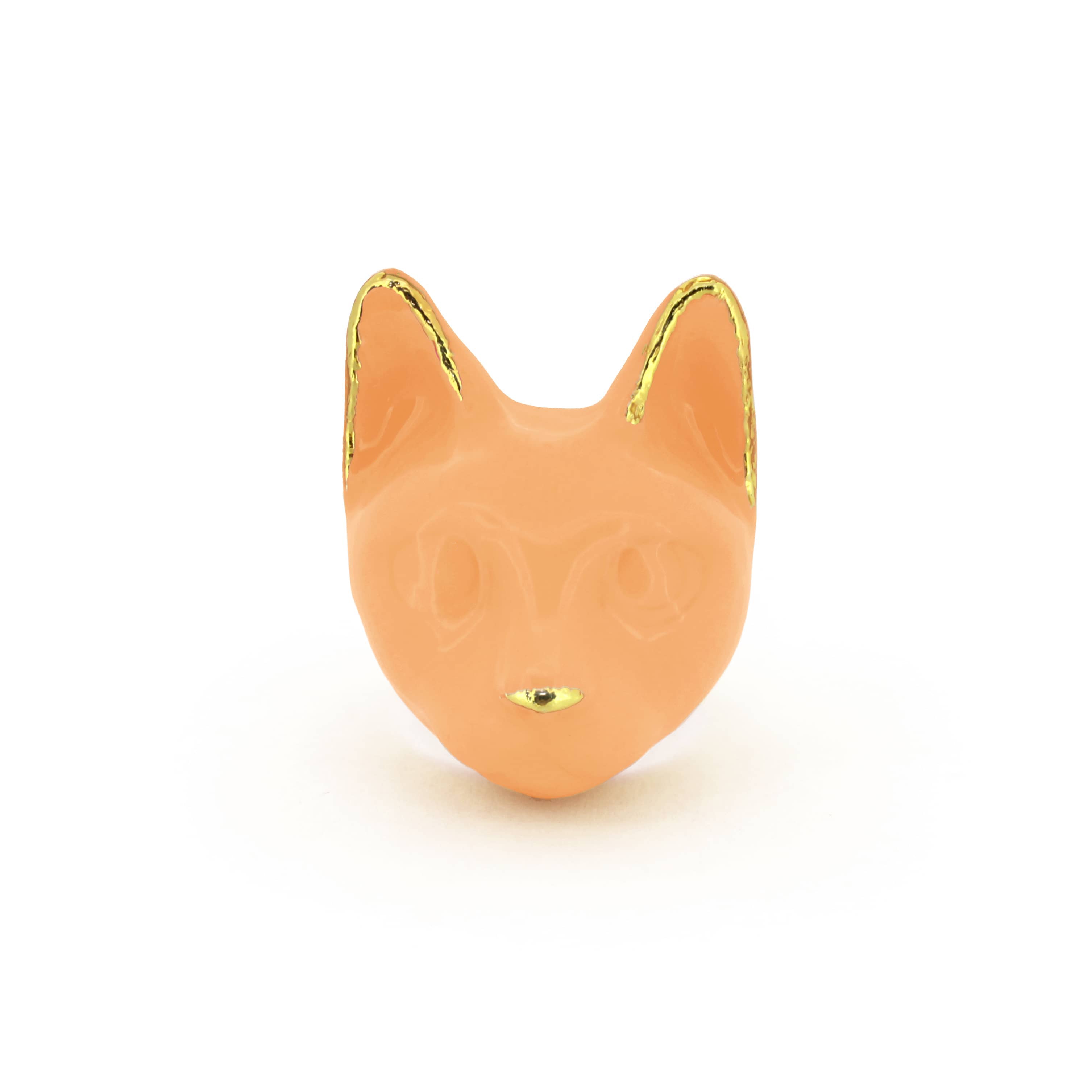 A orange cat's head ring with gold accents on the ears and a small gold nose