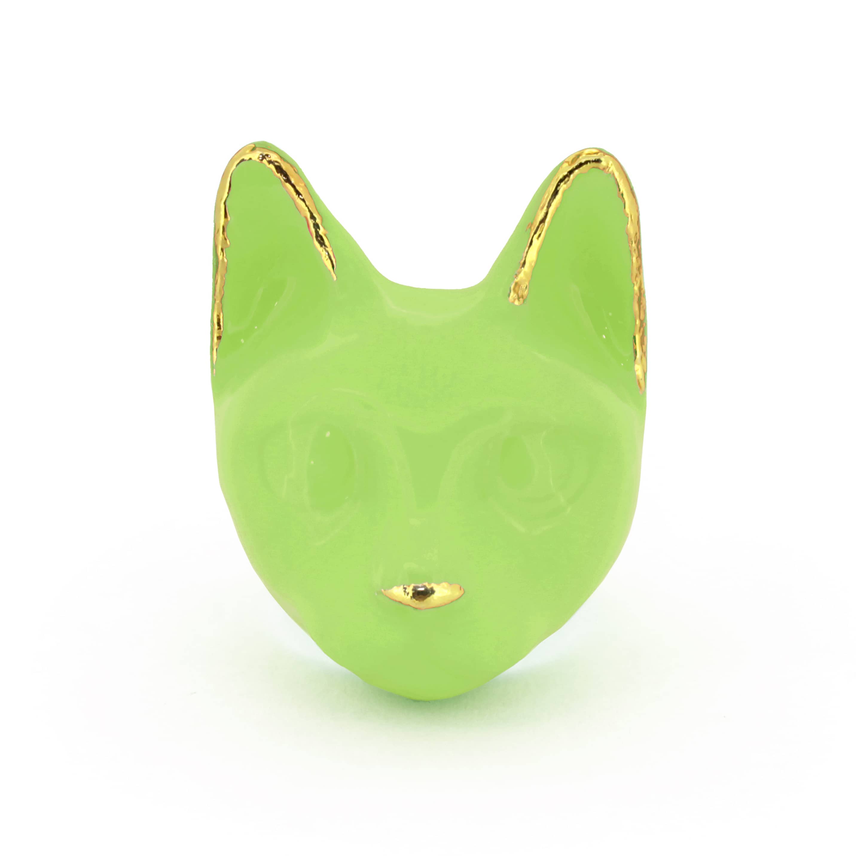A vibrant green cat's head ring with gold accents on the ears and a small gold nose