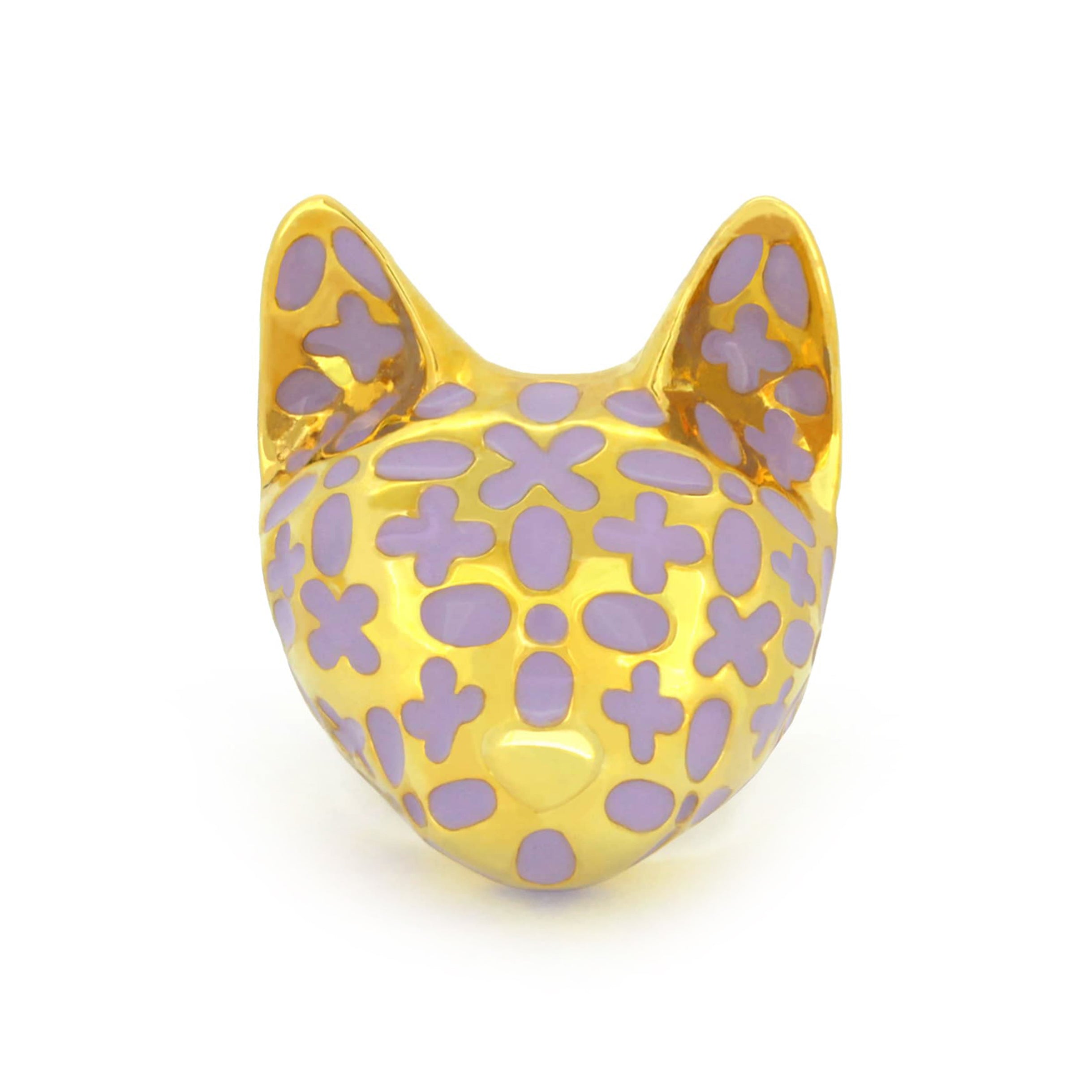 A gold cat ring featuring purple floral patterns.