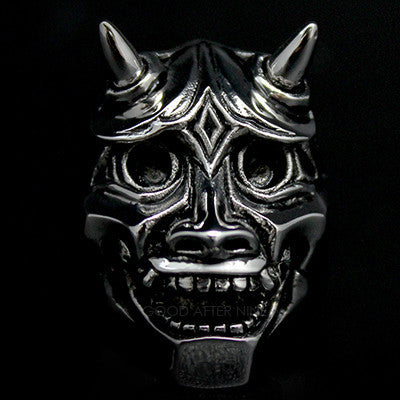 An artisan-crafted ring depicting a demon face, perfect for unique jewelry lovers.