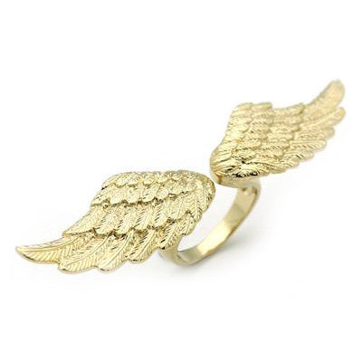 A stylish golden ring featuring intricate wing designs.