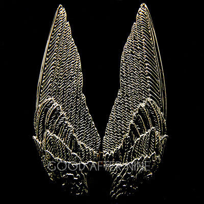 Artisan-crafted ring showcasing elegant wing shapes