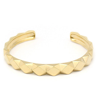 Fashionable geometric design gold bracelet for everyday wear.