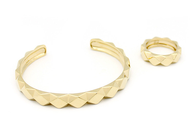 Chic gold geometric bracelet and ring set.