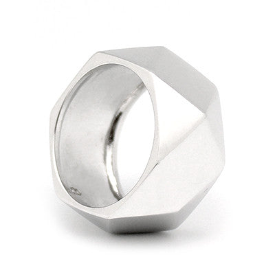 Minimalist silver ring with a faceted design, perfect for everyday wear.