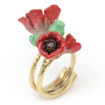 Vibrant flower ring featuring red poppies on a gold-toned band, perfect for flower lovers.