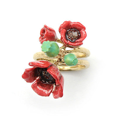 Beautifully crafted flower ring featuring red poppies on a gold-toned band, perfect for flower lovers.