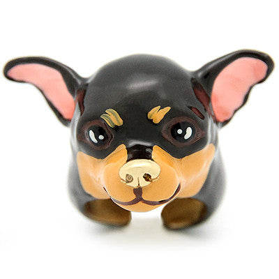 Black and tan dog-shaped ring featuring detailed craftsmanship