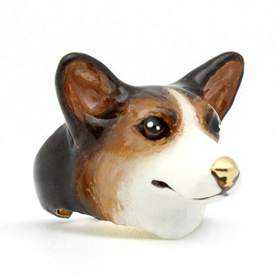 A cute, hand-painted ring featuring corgi head, perfect for dog lovers.