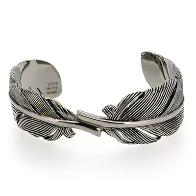 Artisan-crafted bracelet showcasing a beautiful feather design.