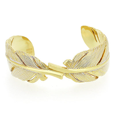 Beautifully crafted gold bangle with a delicate feather design.