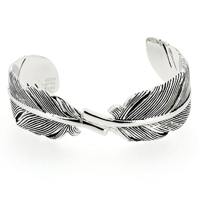 Stylish silver bangle with detailed feather patterns