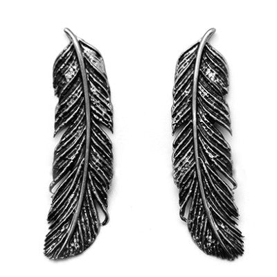 Statement silver earrings with a stunning feather design.
