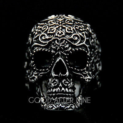 Artisan crafted skull ring with detailed patterns