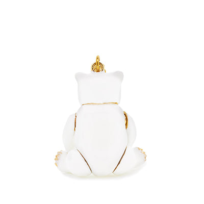 White bear pendant featuring a cute design with black eyes and a gold nose.