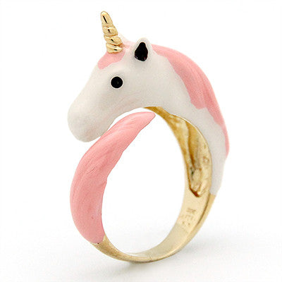 A fantasy-inspired unicorn ring featuring a pink and white design with a golden band.