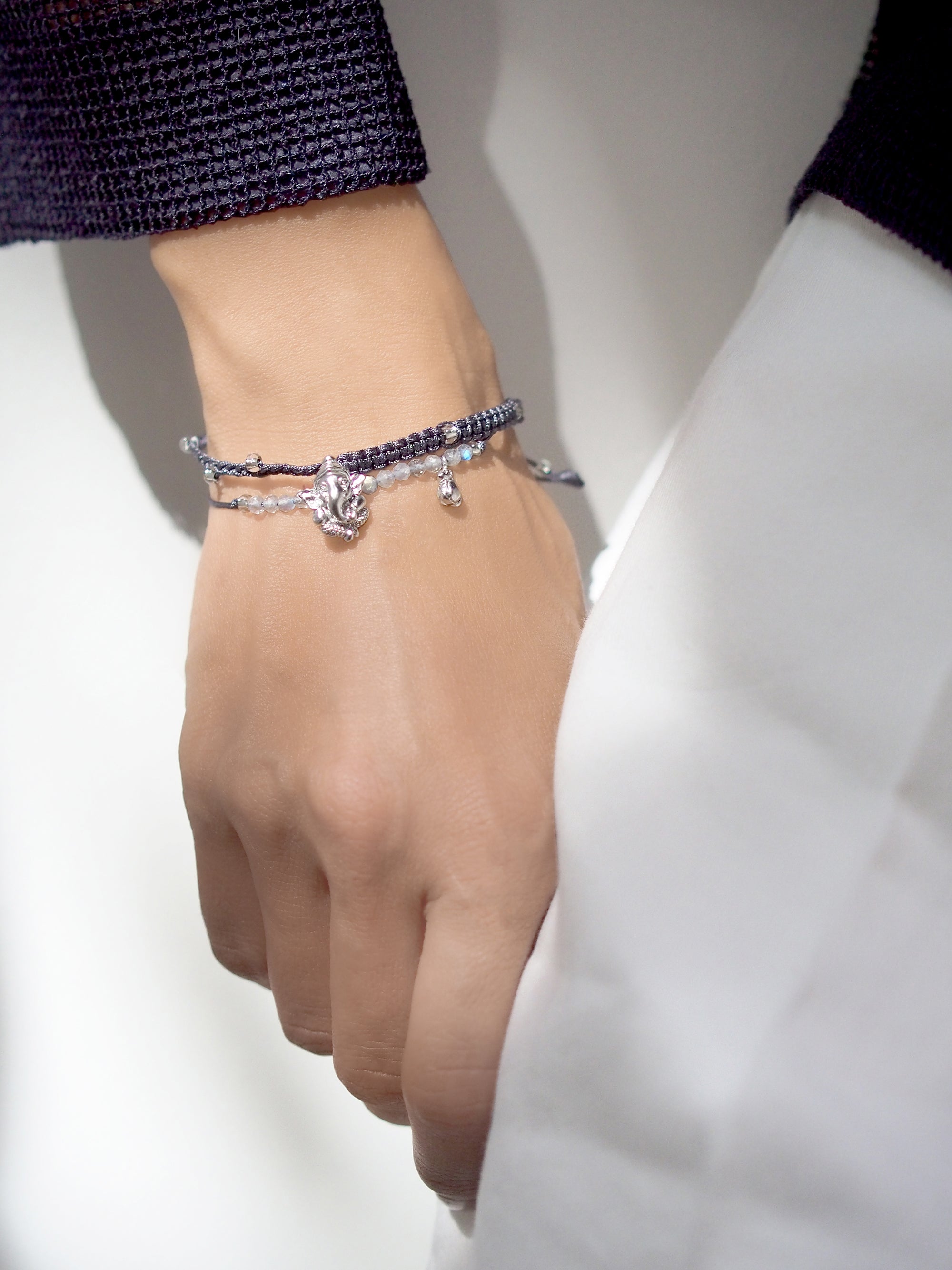 Handmade Ganesh and Musika charm bracelet set worn on a wrist, perfect for everyday look.
