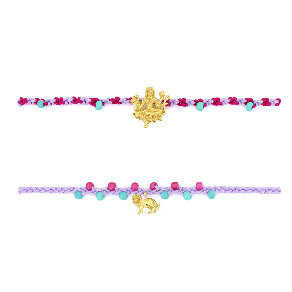 Two bracelets in purple and  pink, and turquoise sand beads, featuring a gold Parvati charm and a gold lion charm.