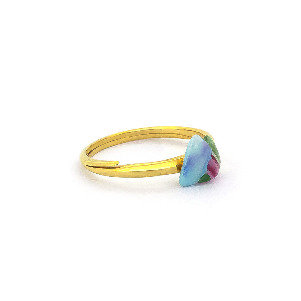 Vibrant mountain ring featuring blue, green, and pink stones.