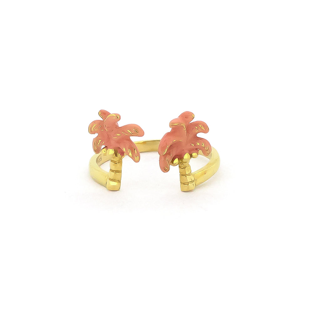 Beautifully crafted gold ring with pink palm trees design, perfect for summer fashion.
