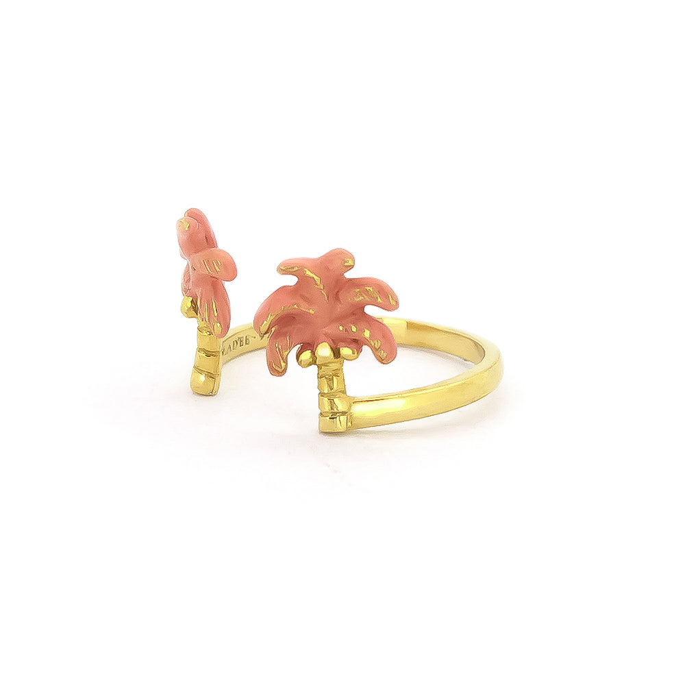 Beautifully crafted gold ring with pink palm trees design, perfect for beach fashion.