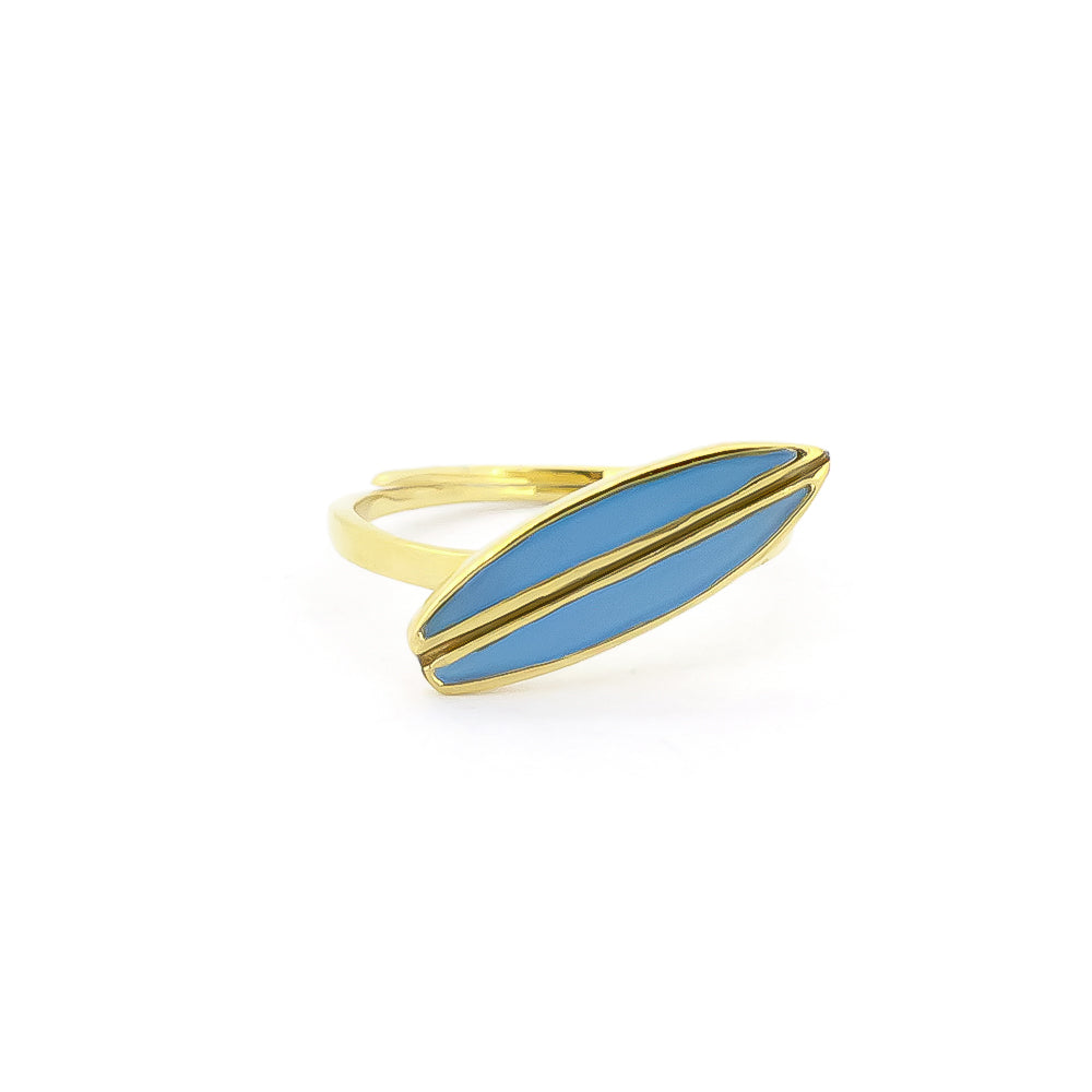 Handcrafted gold ring with a blue surfboard design