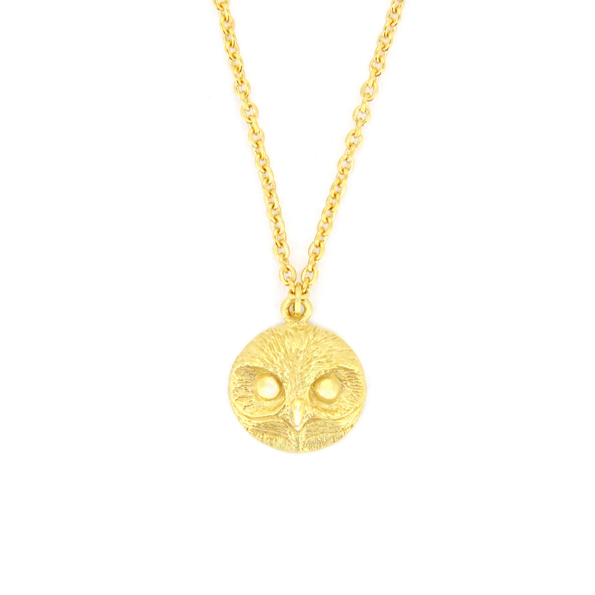 Handmade gold necklace with an intricately designed owl charm